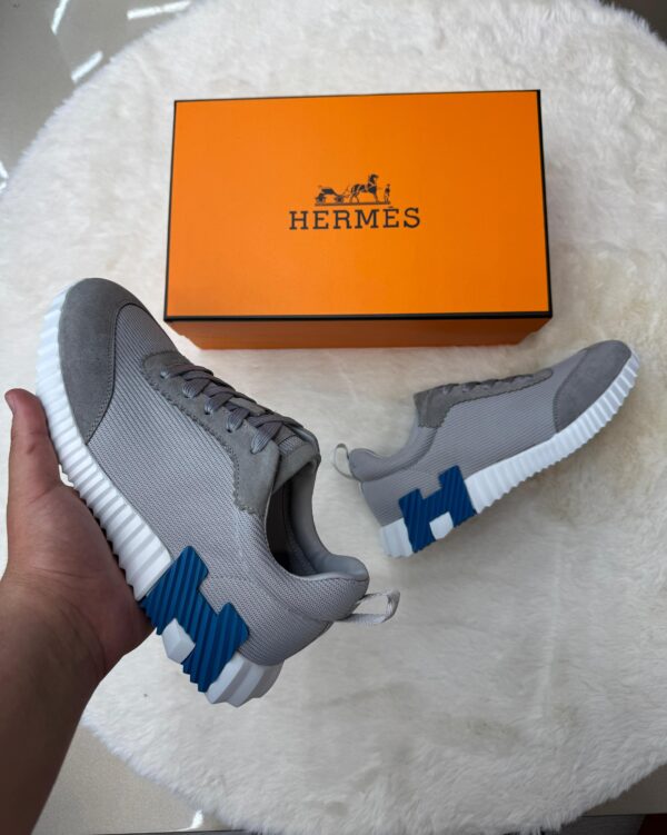 Hermes Bouncing Grey Blue Logo